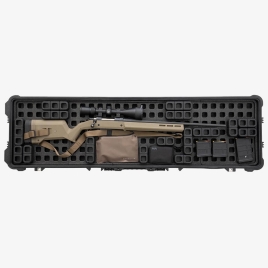 Top view of Magpul DAKA GRID Organizer for Pelican 1750 Protector with Magpul flat dark earth Hunter X-22 Stock – Ruger 10/22 inside. Along with flat dark earth DAKA pouch, 1 black 7.62 10 round PMAG, and 7.62 5 round PMAG organized in DAKA GRID Organizer