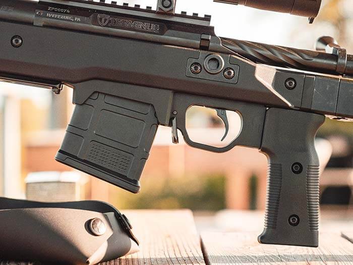 Closeup of Magpul PMAG 10 5.56 AC in a Magpul Pro 700 Stock with custom action